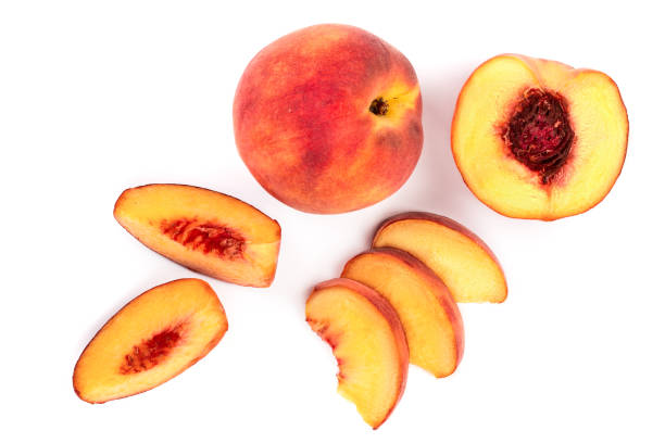 istock ripe peaches isolated on white background. Top view. Flat lay pattern 1071354508