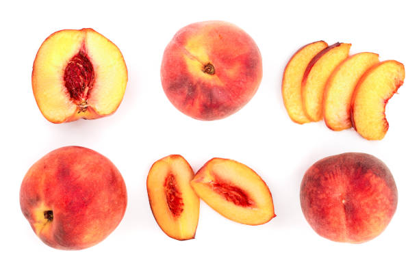 istock ripe peaches isolated on white background. Top view. Flat lay pattern 1071354546