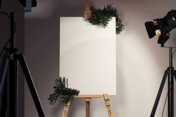 istock Easel and blank white canvas with Christmas decoration. 3d rendering. 1071356512