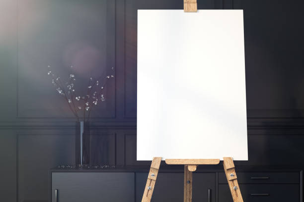 istock Easel and blank white canvas with christmas decoration. 3d rendering. 1071356518
