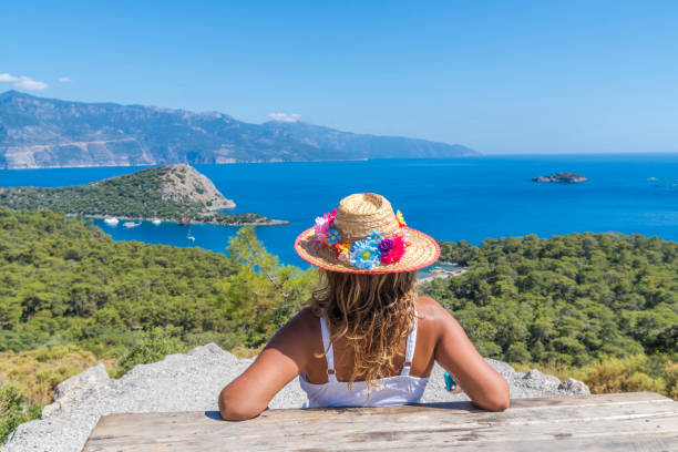 istock Woman watching the sea. 1071367858