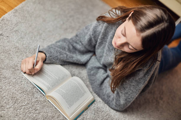 istock Seventeen year old teenager doing her homework 1071372422