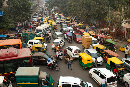 Traffic jam on the polluted streets of New Delhi, India. Delhi has the highest number of motor vehicles and the traffic congestion is limited in few areas.