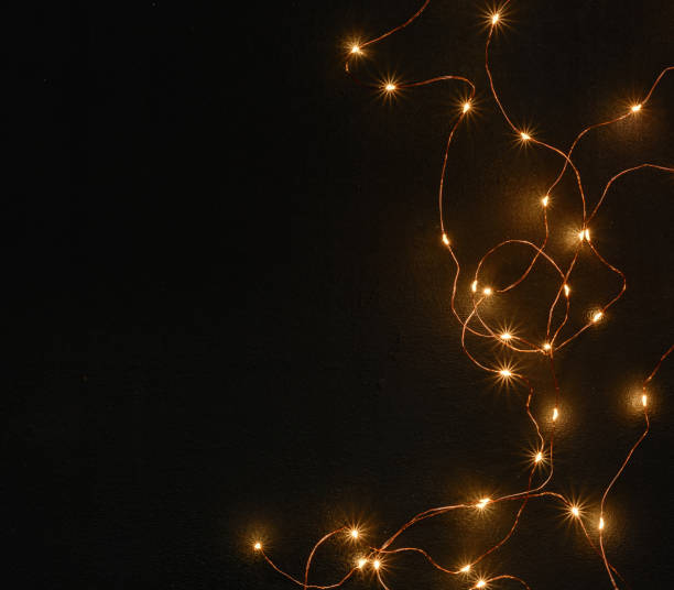 istock Dark Christmas background with small lights. Place for text. Blank for postcard or poster. 1071375336