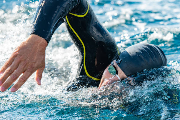 istock Open water swimmer swimming in sea 1071375712