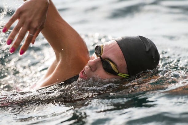 istock Open water swimmer swimming in sea 1071375756