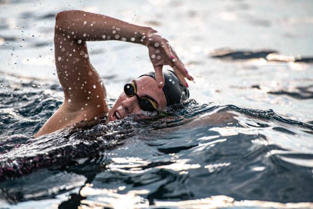 istock Open water swimmer swimming in sea 1071375764