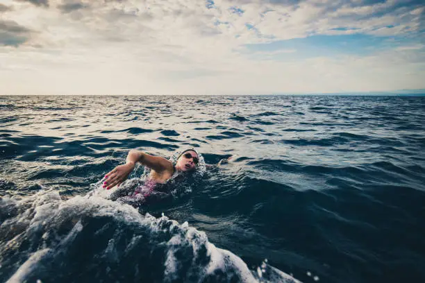Photo of Open water swimmer swimming in sea