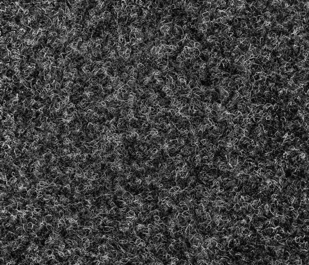 istock Carpet black artificial. Interlacing of fibers. Black white background. 1071376232