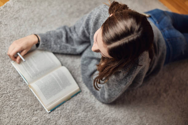 istock Seventeen year old teenager doing her homework 1071377734
