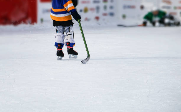 istock Kids at ice hockey practice. 1071379070