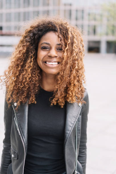 istock Happy genuine smiling young African woman 1071380992