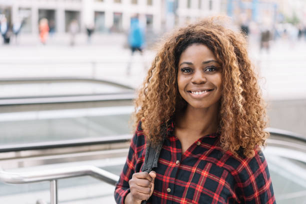 istock Confident friendly young African woman 1071381428