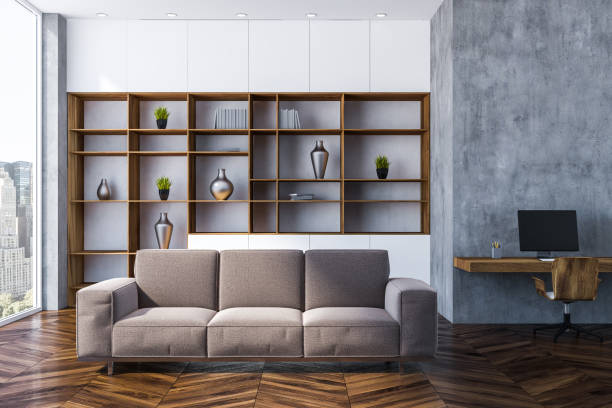 istock Gray home office interior, bookcase and sofa 1071382936