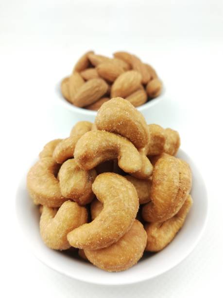 istock assorted cashew, fish cracker, almond, pistachio 1071383420