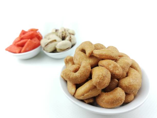 istock assorted cashew, fish cracker, almond, pistachio 1071383814