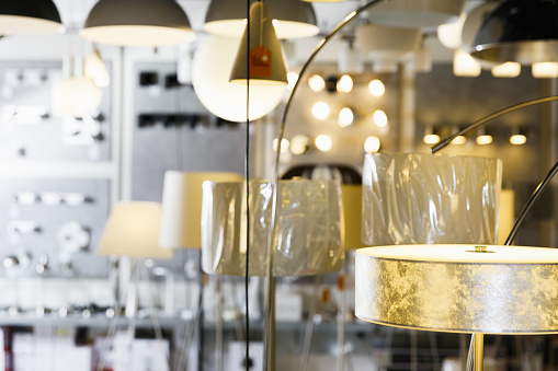 Picture of different modern lamp with lights in the  designer furniture store