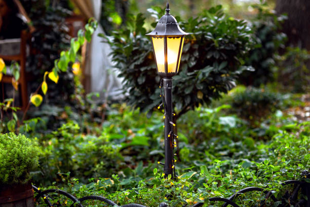 istock a decorative iron lantern tied with a garland. 1071392916