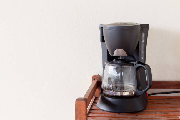 coffee maker on wooden table