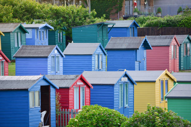 Colourful Wooden Beach Huts stock photo