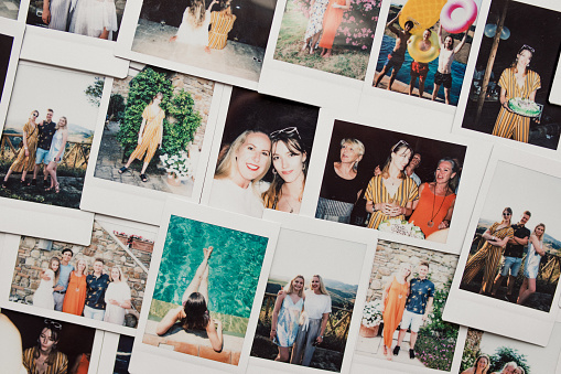 Flat lay montage of instant film photos of friends on vacation in Tuscany, Italy.