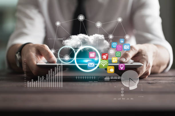 Startup launch concept on tablet with hologram Businessman using tablet payments online shopping and network connection icons on hologram virtual screen application modernization stock pictures, royalty-free photos & images