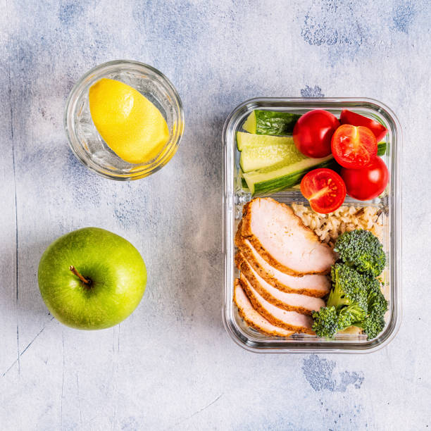 istock Healthy balanced lunch box with chicken, rice, vegetables 1071409050