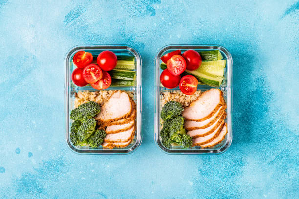 istock Healthy balanced lunch box with chicken, rice, vegetables 1071409080