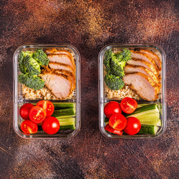 istock Healthy balanced lunch box with chicken, rice, vegetables 1071409126