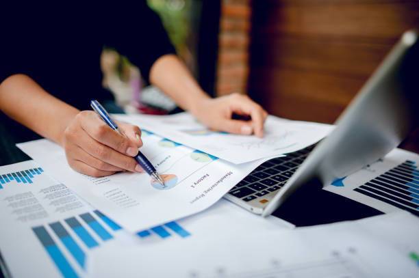 istock Businessman working at a computer office And graphs on his desk. Business ideas and space for copy. 1071409318