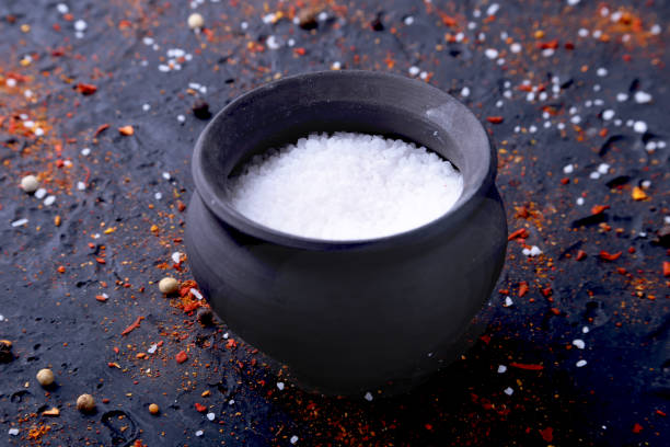 istock Red spices, salt and pepper on black marble. Black abstract background. Top view. 1071412102