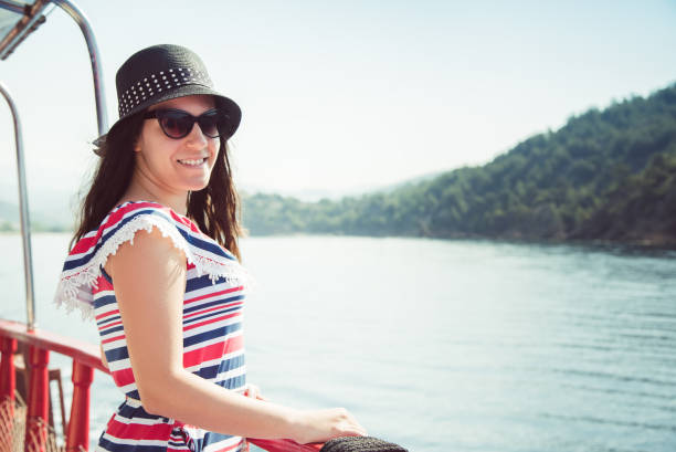 istock Young woman on a boat ride 1071412560