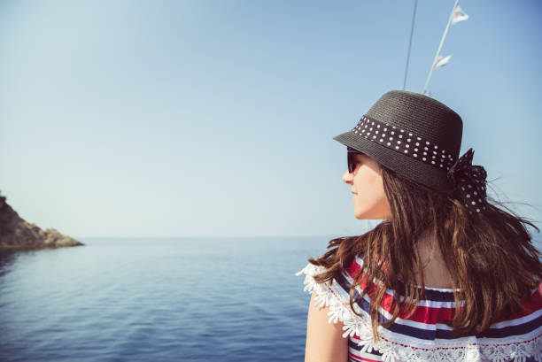 istock Young woman on a boat ride 1071413994
