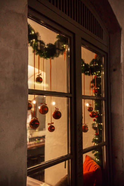 istock Window with Christmas decor in the evening 1071423568