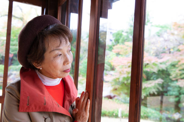 istock Senior woman enjoying autumn 1071430054