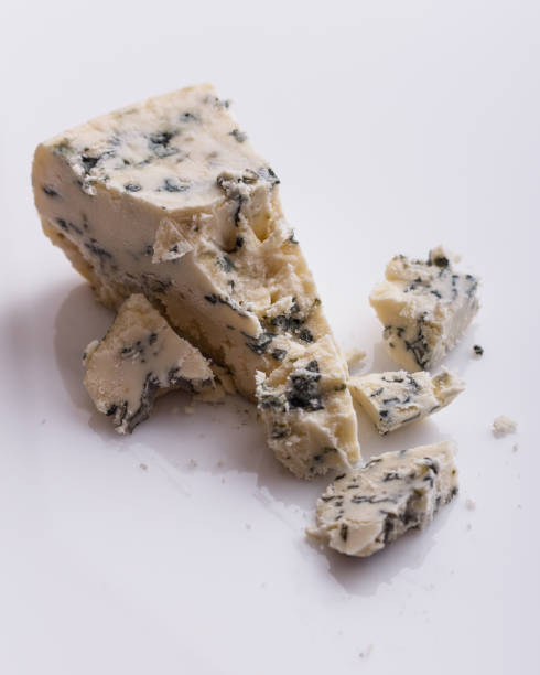 istock delicious blue cheese on a white background 1071430860