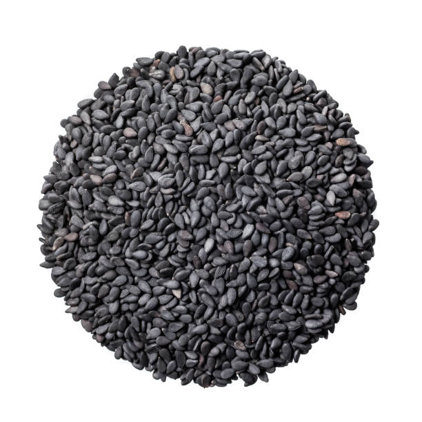 istock Black sesame seeds on a white background 1071432886