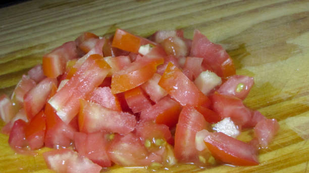 istock Red and shiny tomatoes on the table 1071435806