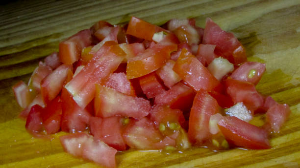 istock Red and shiny tomatoes on the table 1071437766