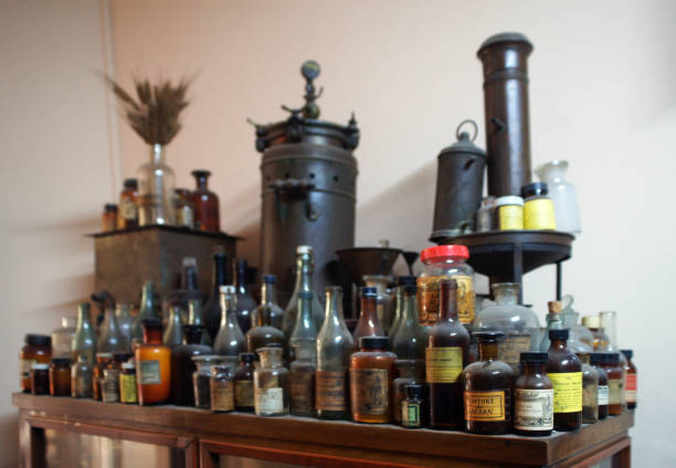 old medicine bottles and machinery -Antique pharmacy jars