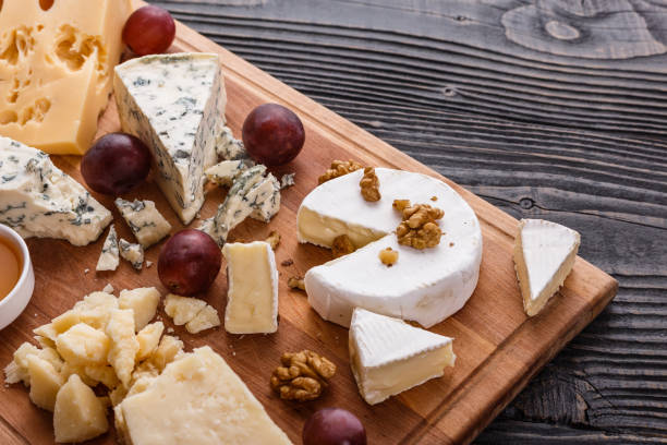 istock set of different cheeses on a wooden rustic background 1071444190