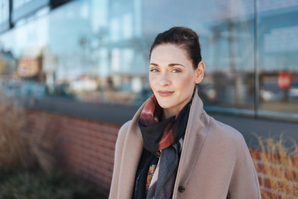 istock Woman standing outside a commercial building 1071445184