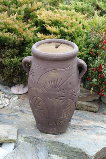 istock Handmade clay amphora and small garden design inspiration 1071449104
