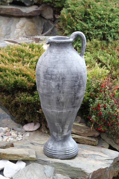 istock Handmade clay amphora and small garden design inspiration 1071450734