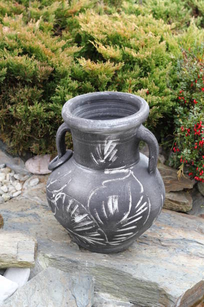 istock Handmade clay amphora and small garden design inspiration 1071450860