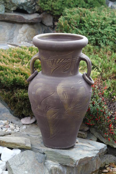 istock Handmade clay amphora and small garden design inspiration 1071451444