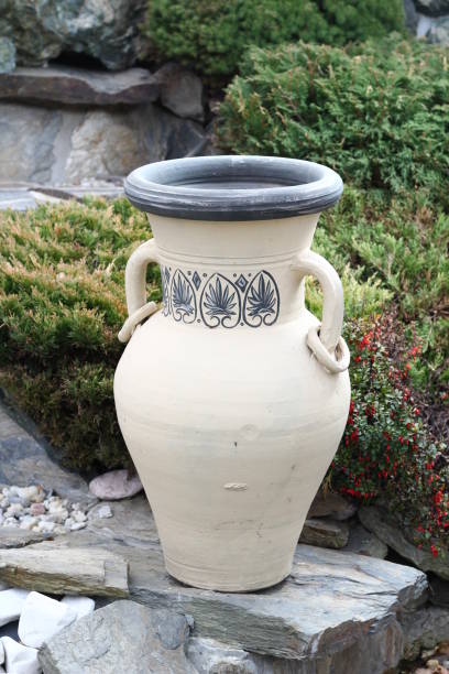 istock Handmade clay amphora and small garden design inspiration 1071452220
