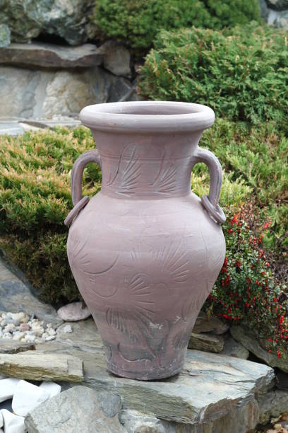 istock Handmade clay amphora and small garden design inspiration 1071452458