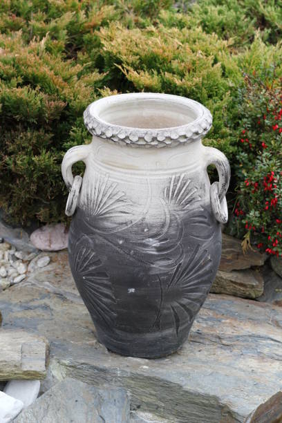 istock Handmade clay amphora and small garden design inspiration 1071454948