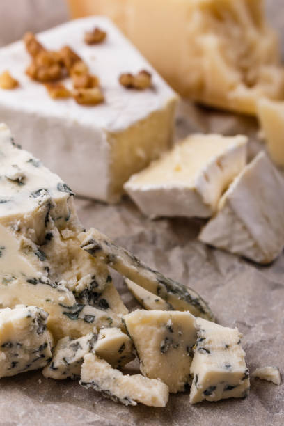istock set of different cheeses on a wooden rustic background 1071456574
